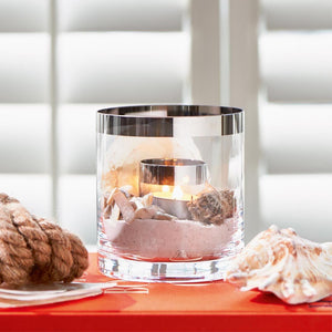 Riviera Double Hurricane Candle Holder with 2 lit candle inside 